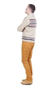 Back view of handsome man in warm sweater looking up Stock Photos