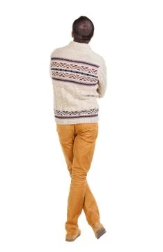 Back view of handsome man in warm sweater looking up Stock-Fotos