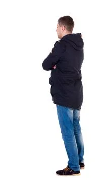 Back view of handsome man in winter jacket  looking up Stock Photos