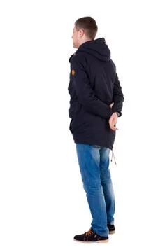 Back view of handsome man in winter jacket  looking up Stock Photos