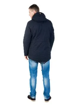 Back view of handsome man in winter jacket  looking up Stock Photos