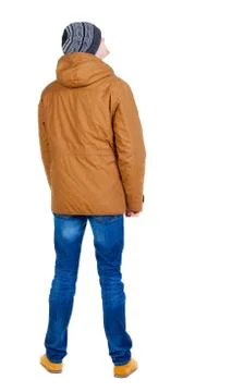 Back view of handsome man in winter jacket  looking up Stock Photos