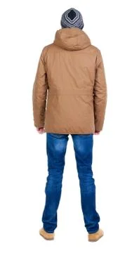 Back view of handsome man in winter jacket  looking up Foto stock