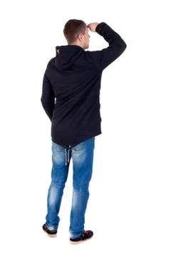 Back view of handsome man in winter jacket  looking up 스톡 사진