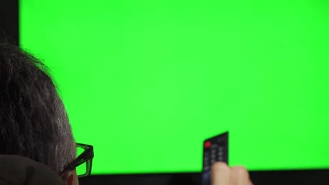 Back view of the head of an elderly white male wearing glasses sitting in front Stock Footage 255041055