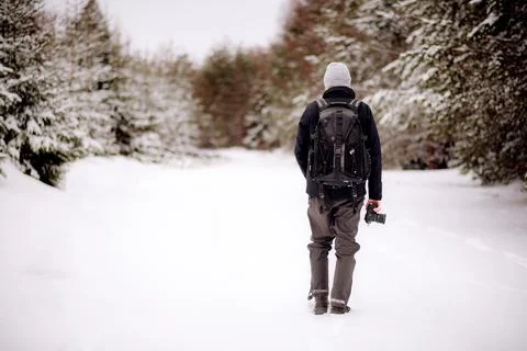 Back view of hiker with camera Foto stock
