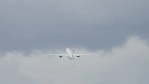 Back view of large commercial passenger airplane departing from the airport. Stock Footage 139031049