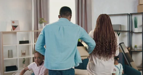Back view of lovely smiling satisfied young african american couple which Stock Footage 150705726