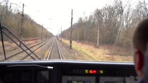 Back view of male train driver sitting in cabin. passenger train Video stock 208876494