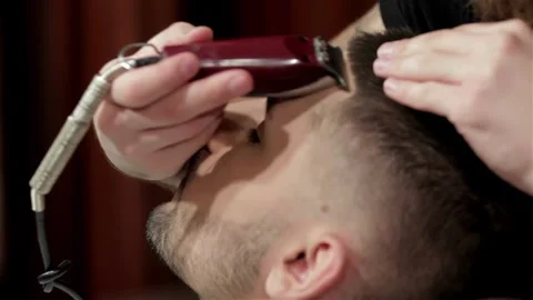 Back view of man in barber shop Stock Footage 252660633