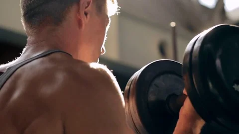 Back view of man in gym 스톡 동영상 77877111