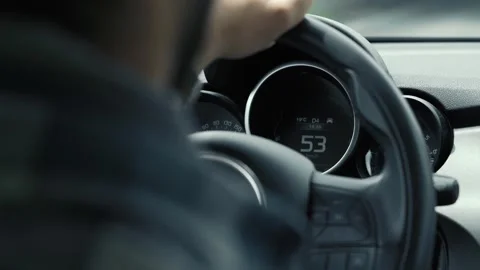 Back view of man hands driving car. Transportation concept. Stock Footage 260430354