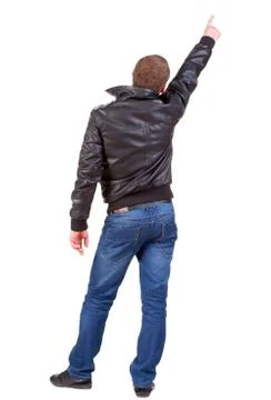 Back view of  man in jacket  pointing Stock Photos