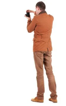 Back view of man photographing Stock-Fotos
