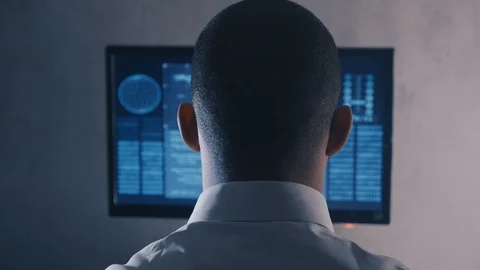 Back view of man programmer in white shi... | Stock Video | Pond5