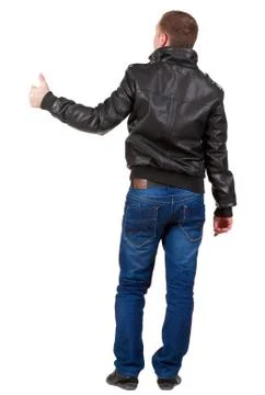 Back view of  man shows thumbs up Foto stock