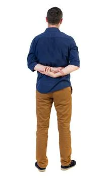 Back view of man . Standing young guy Foto stock