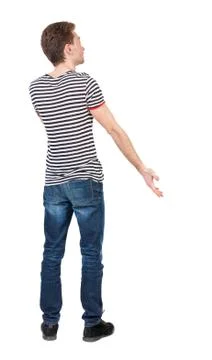 Back view of man . Standing young guy Foto stock