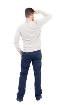 Back view of man . Standing young guy Foto stock