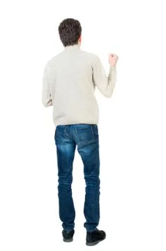 Back view of man . Standing young guy Stock Photos