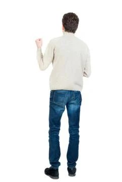 Back view of man . Standing young guy Foto stock