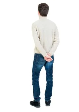 Back view of man . Standing young guy Foto stock