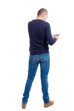 Back view of man in suit  talking on mobile phone Stock Photos