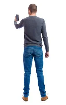 Back view of man in suit  talking on mobile phone Stock Photos