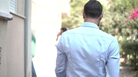 Back View of Man Walking at Outdoors Stock Footage 143938457