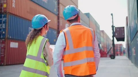 Back view of manager and worker talk in the container yard Stock Footage 196291056