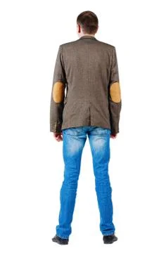 Back view of men in jacket suit and jeans Stock Photos