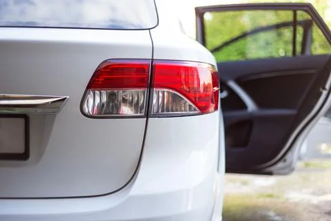 Back view of modern car with open doors Stock-Fotos