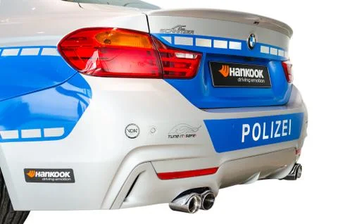 Back view of new modern model bmw german police patrol car Stock Photos