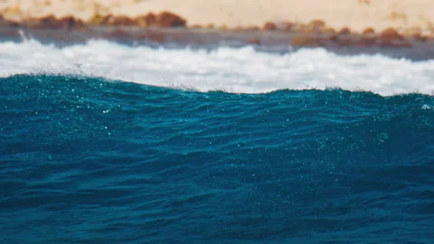 Back view of the ocean wave breaking on ... | Stock Video | Pond5