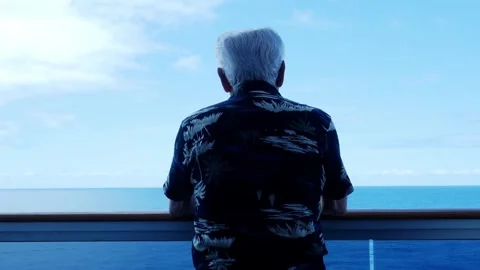 Back view of older unidentifiable man wearing a holiday shirt on a cruise ship Stock Footage 259347503