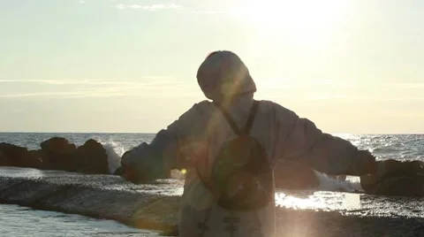 Back view of a person looking to the sea Stock Footage 10709039