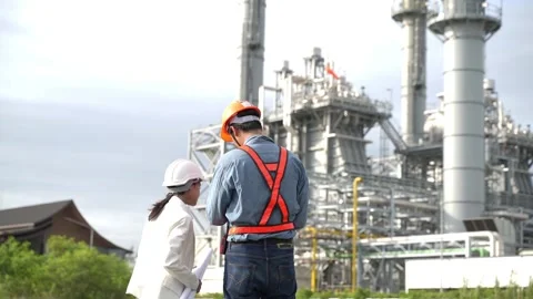 Back view Planning engineering and project leader working and check Plans at Ind 動画素材 279505304