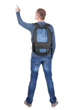 Back view of  pointing man with backpack looking up Stock Photos
