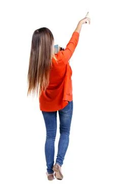 Back view pointing woman with a stack of books Stock Photos