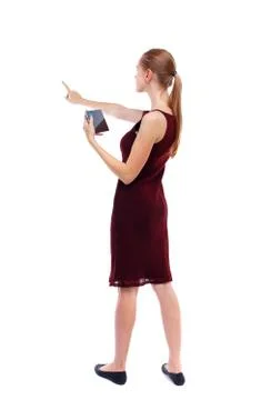 Back view of pointing young beautiful  girl with tablet computer Stock Photos
