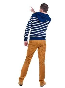 Back view of  pointing young men in  hooded sweater Foto stock