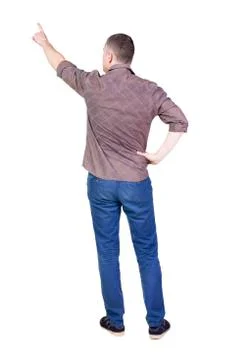 Back view of  pointing young men in  shirt and jeans Stock Photos