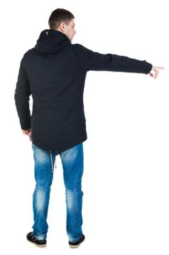 Back view of  pointing young men in parka Stock Photos