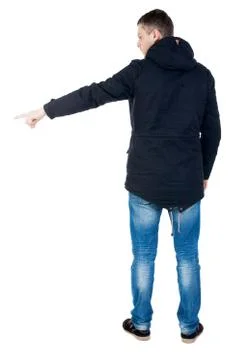 Back view of  pointing young men in parka Stock Photos
