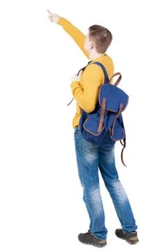 Back view of  pointing young men with backpack Foto stock