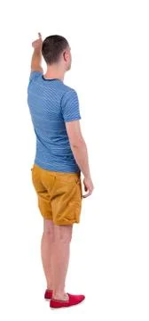 Back view of  pointing young men in  t-shirt and shorts Stock Photos