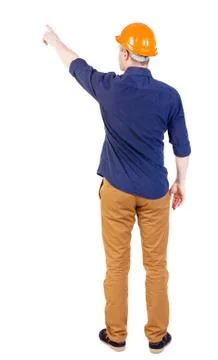 Back view of  pointing young men in  shirt and helmet Foto stock