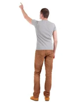 Back view of  pointing young men in  shirt and jeans Stock Photos