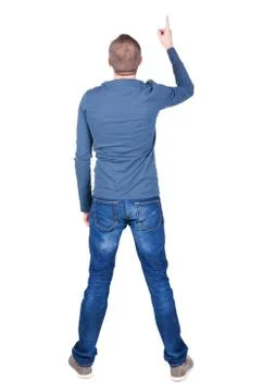 Back view of  pointing young men in  shirt and jeans Stock Photos