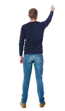 Back view of  pointing young men in  shirt and jeans Foto stock